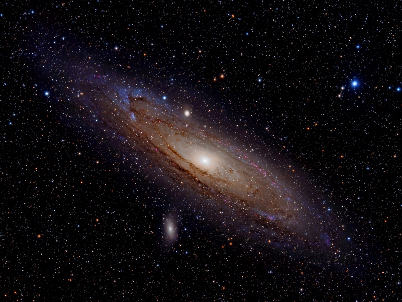 photo of the Andromeda Galaxy and two dwarf galaxies
